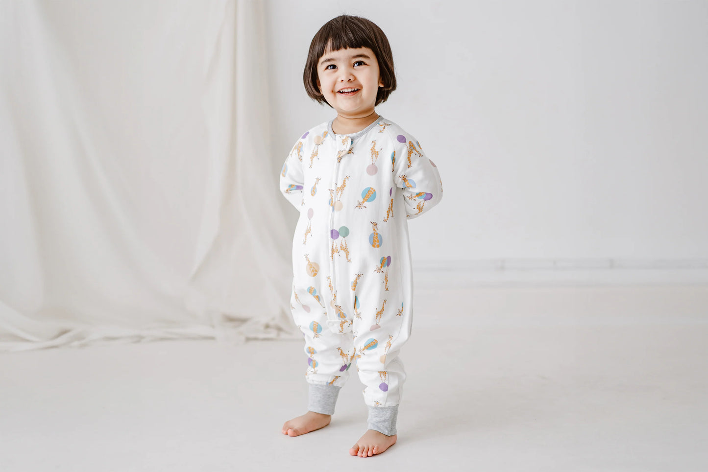 Long Sleeve Footed Sleep Bag 0.6 TOG (Bamboo Pima) - Giraffe Shapes